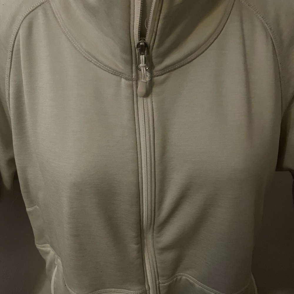 Ivory sweater with pockets on each side